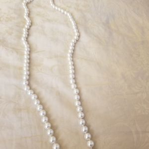 Brand New long pearls with clasp